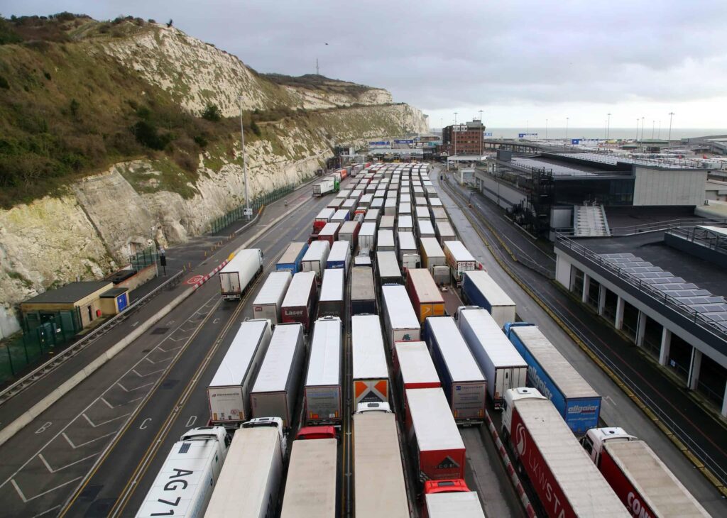 Haulage truck crossing UK-EU border with compliance documents